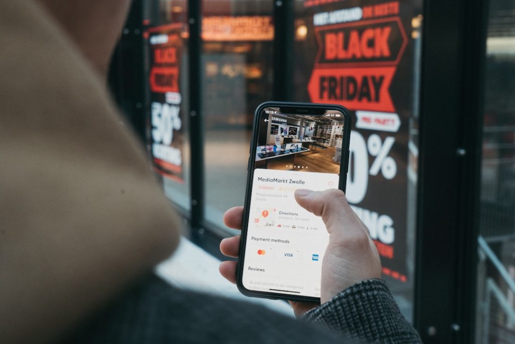 person holding black samsung android smartphone pwxesdwrwde.jpeg